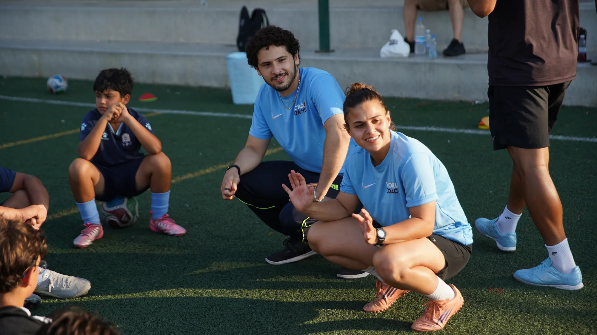 Coaches talking with players during a break