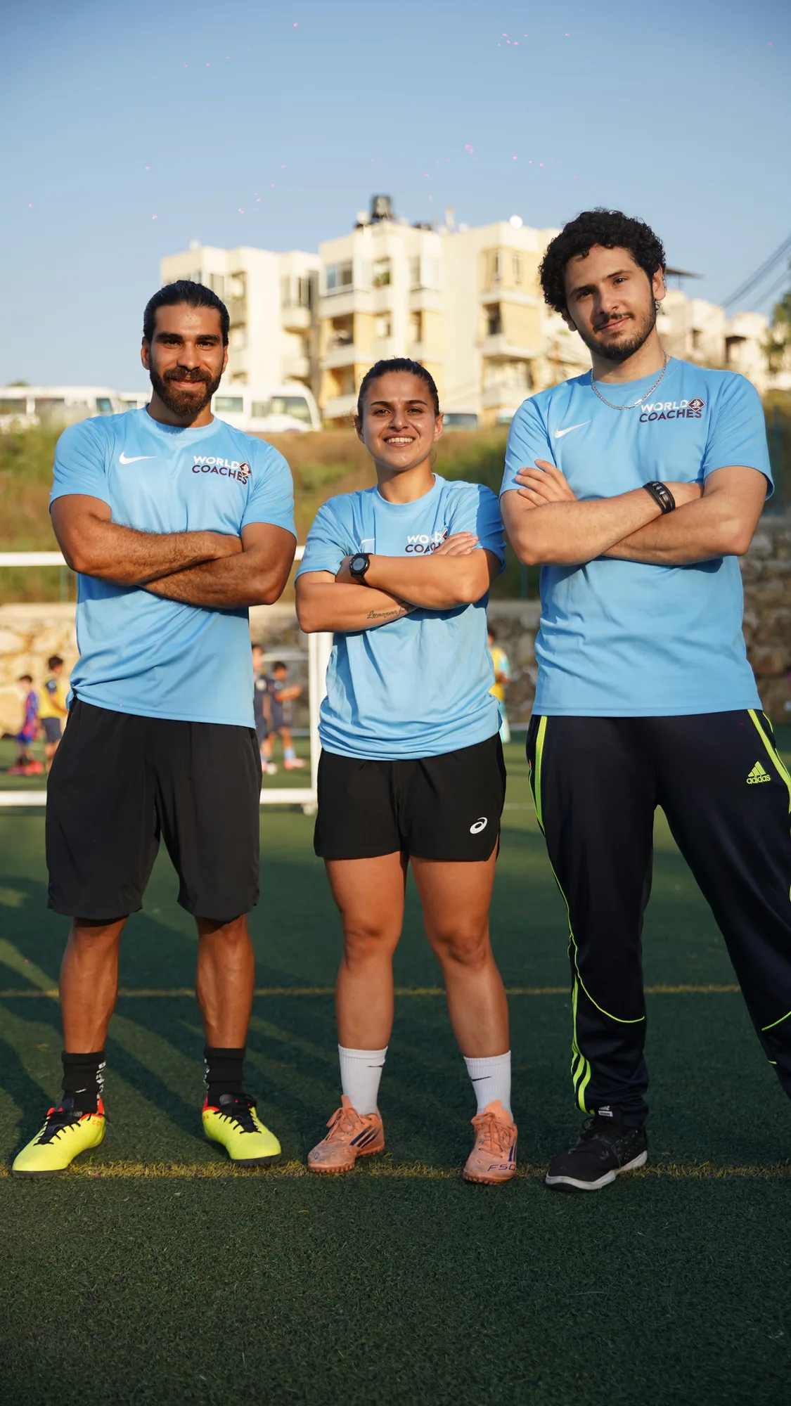 The B-Elite Academy coaching team on the pitch